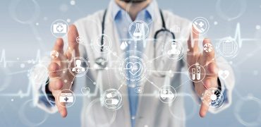 Doctor using digital medical futuristic interface 3D rendering Doctor on blurred background using digital medical futuristic interface 3D rendering